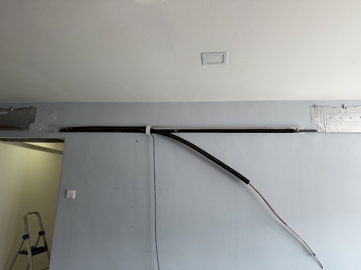 New installation: trunking and piping run with mounting plates fitted