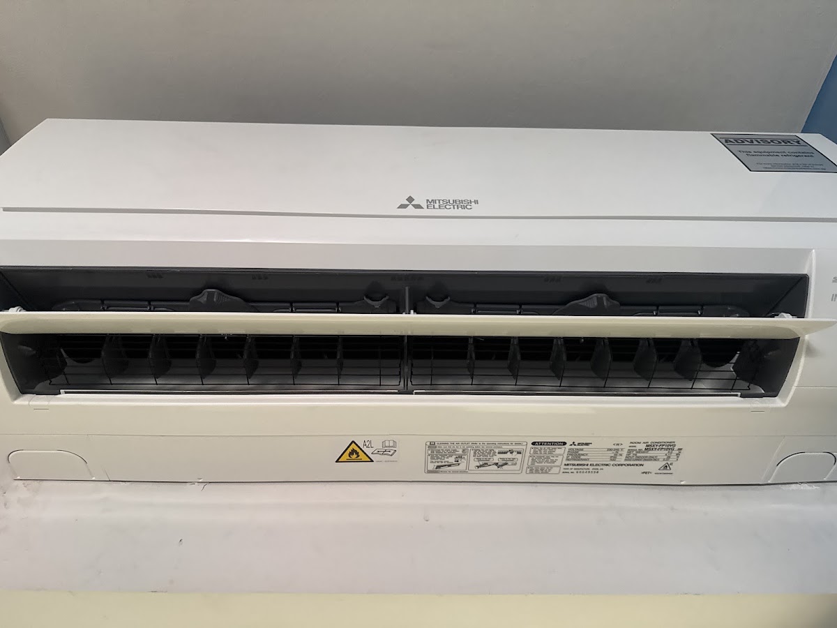 Brand-new Mitsubishi Electric indoor unit, front open before installation